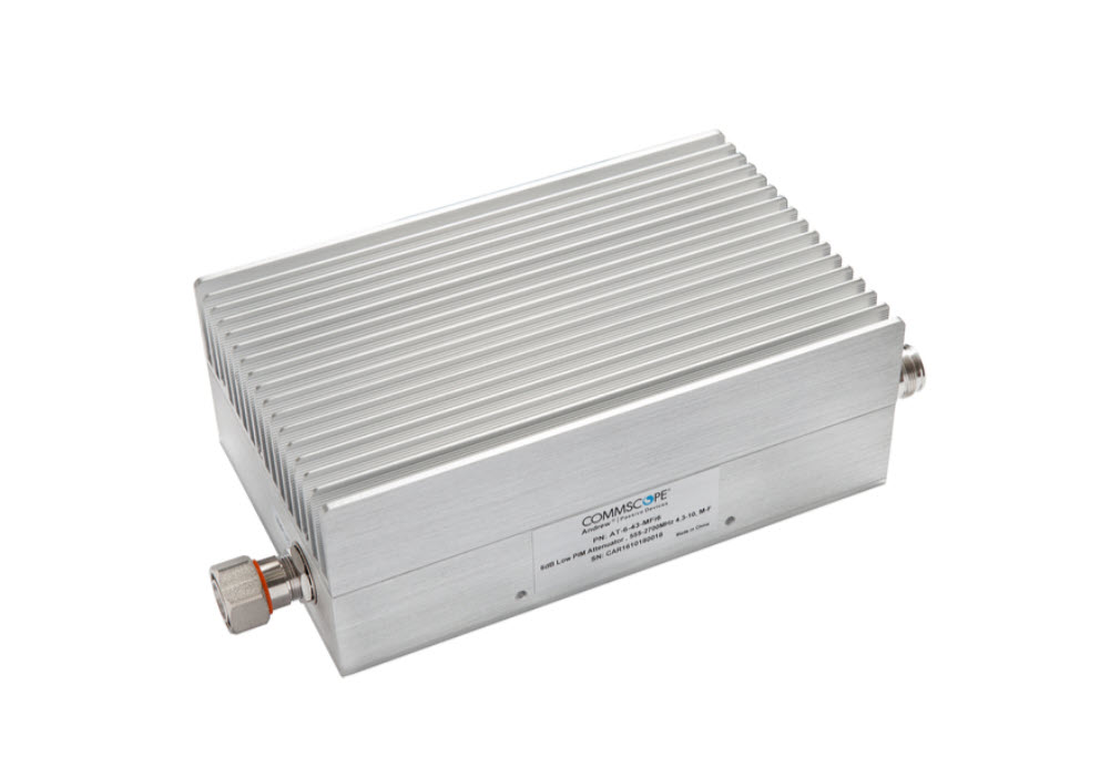 Aluminum box with fins and two connectors on the sides.