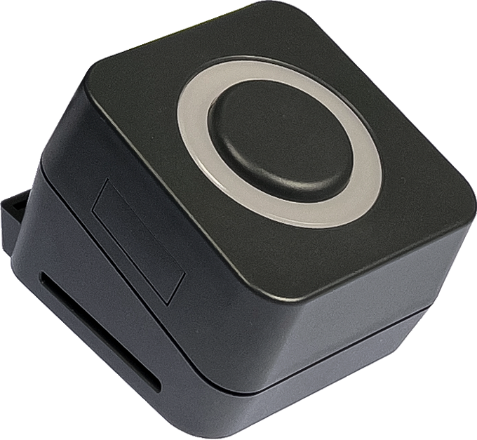 PTRB-Button.png Square black device with a central button.