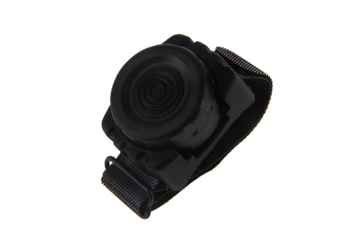 Schwarzer, runder Schalter mit Klettbandbefestigung.