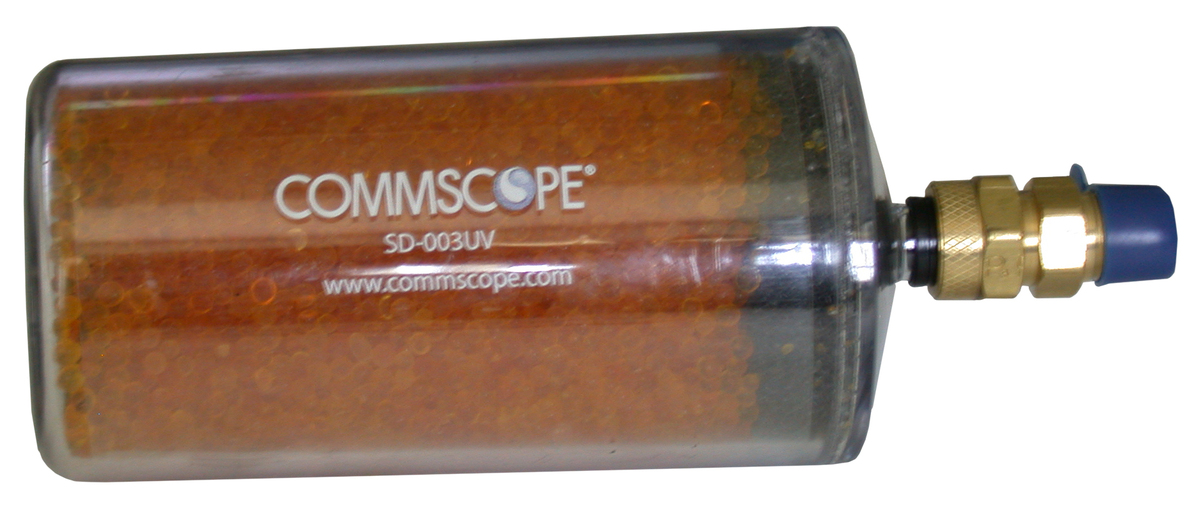 Transparenter Zylinder mit orangen Kügelchen und einem Metallanschluss.