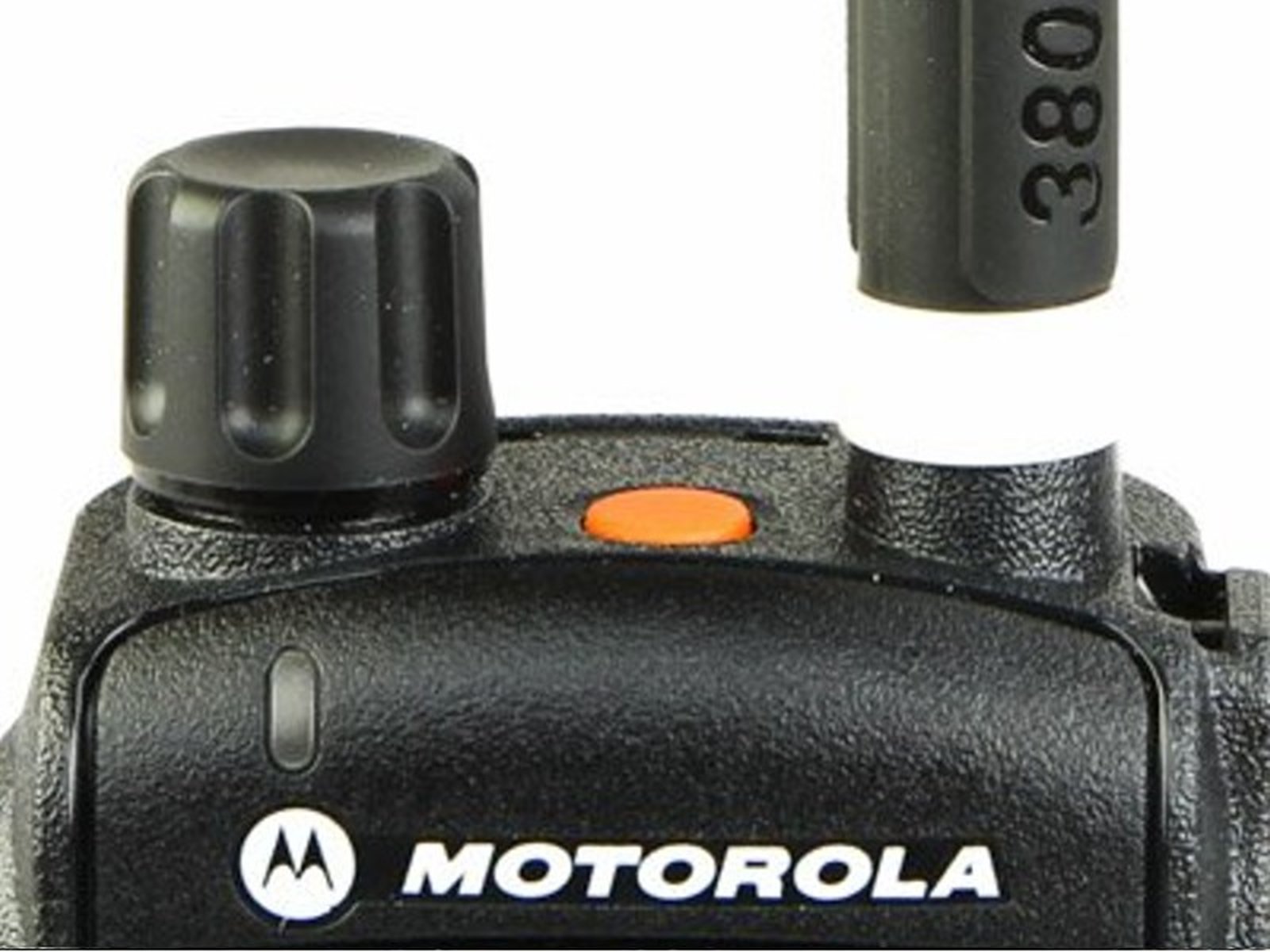 Close-up of a walkie-talkie with a knob and antenna.