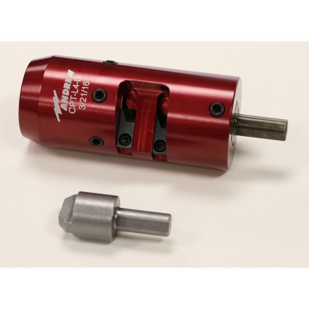 Red cylindrical adapter with silver insert on light background.