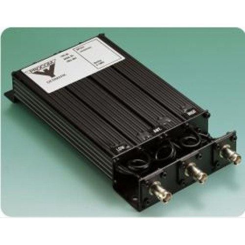 Rectangular black electronic housing with three connectors on a green surface.