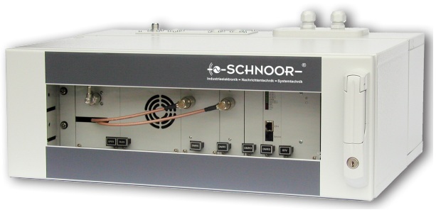 A closed electronic device with various ports and a fan.