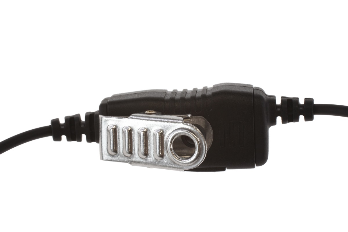 Close-up of a black cable connector with silver metal clip.