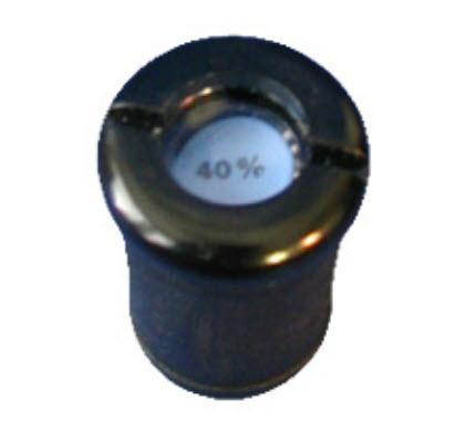 Close-up of a round metal object with 40% marking on the top.