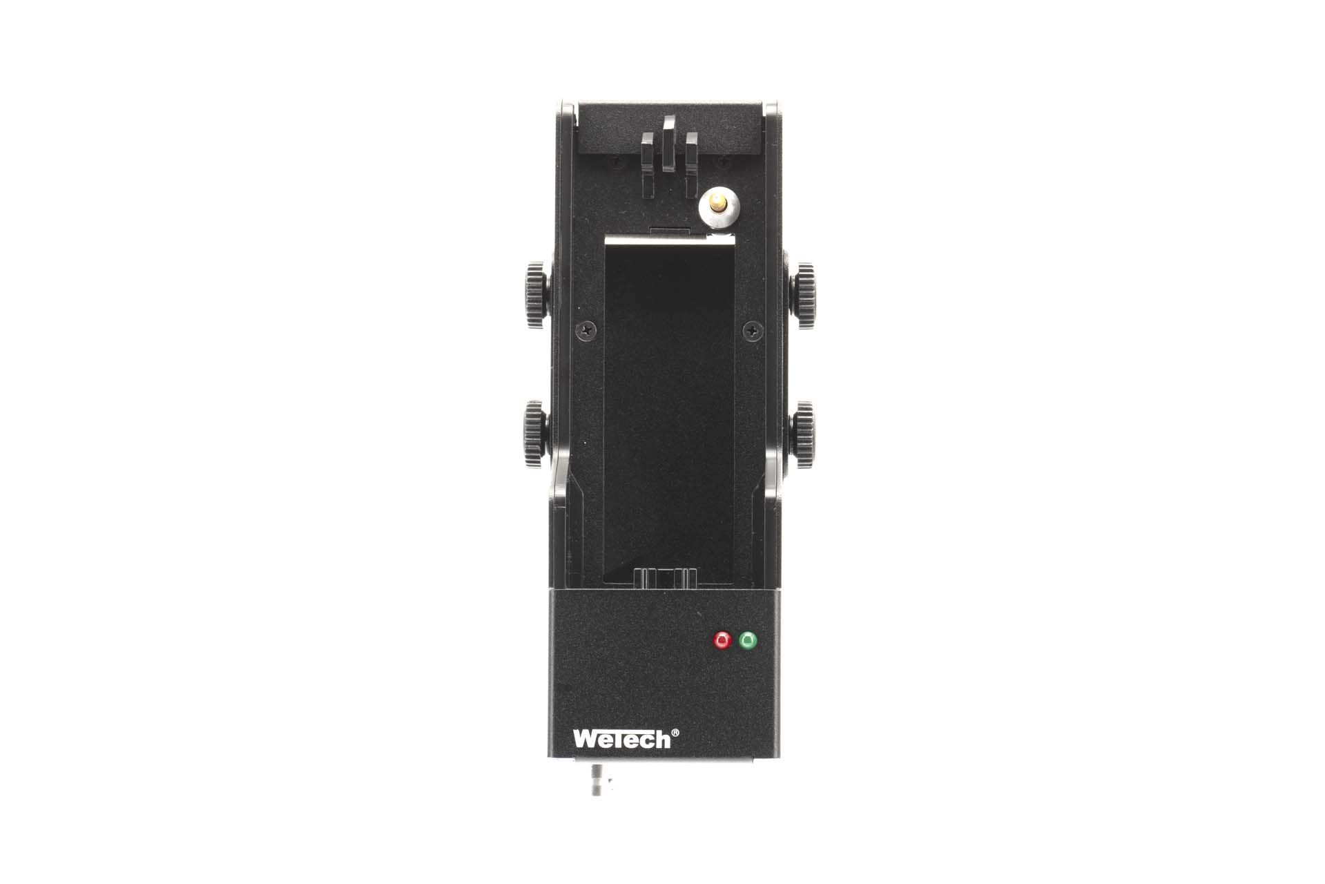 7000-00752964_wem_04.jpg Black mechanical device with multiple knobs and a green and red light.