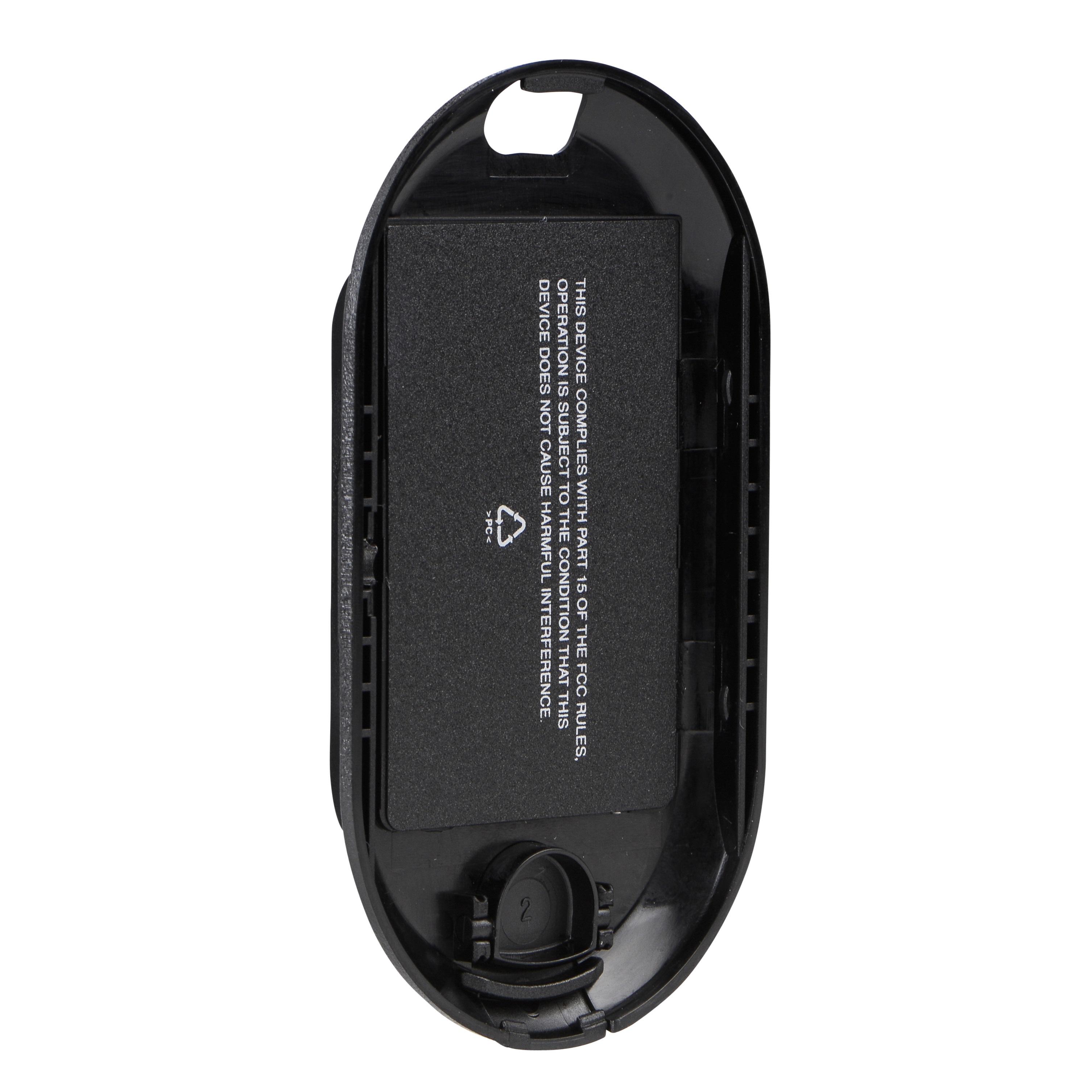 7000-00367500_mot_02.jpg Open battery compartment with inserted battery and FCC text.