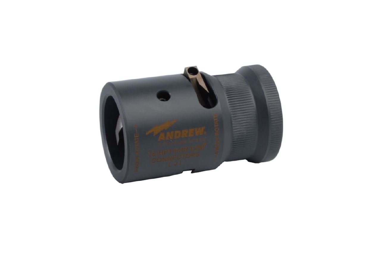 Coaxial cable stripping tool made of gray material with identification marking.