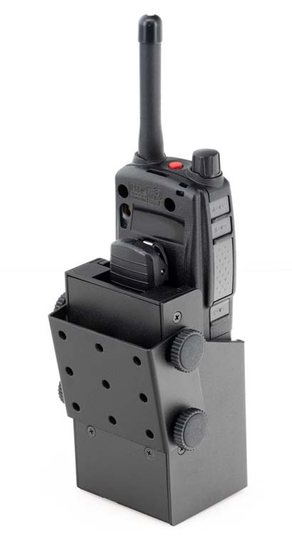Black walkie-talkie in a holder.