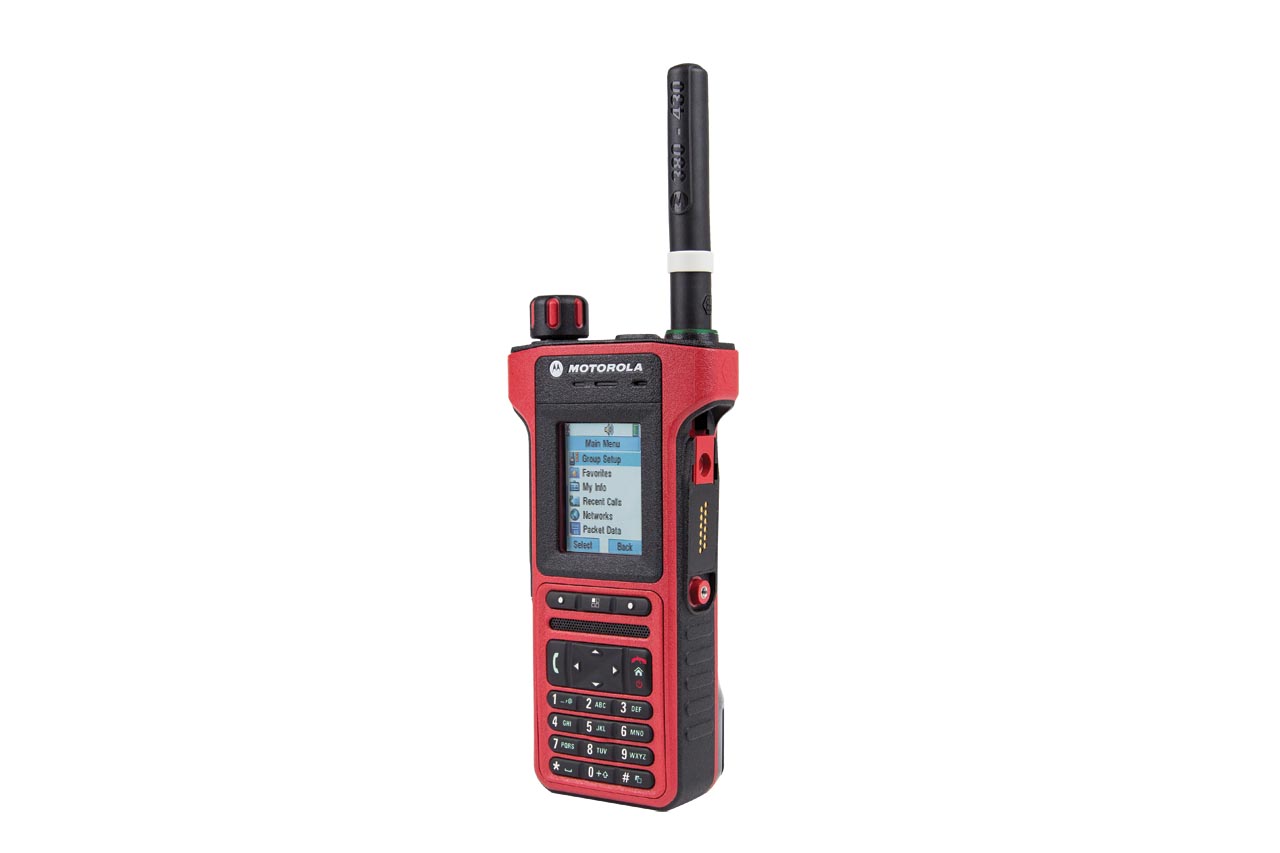 Red radio with antenna, keypad, and screen displaying a menu.