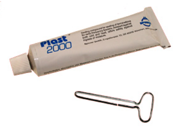 Tube Kleber mit Abrollschlüssel.