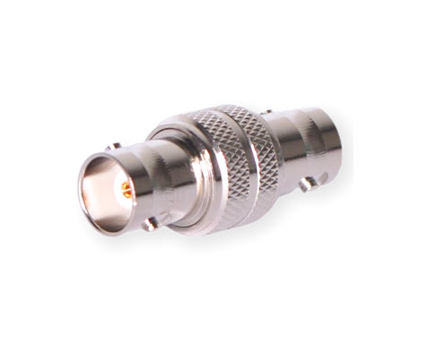 Metallic BNC connector with knurled coupling nut in silver.