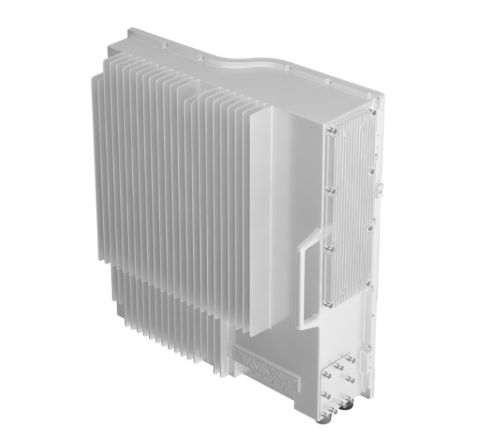 Electronic device with cooling fins and connectors on the right side.