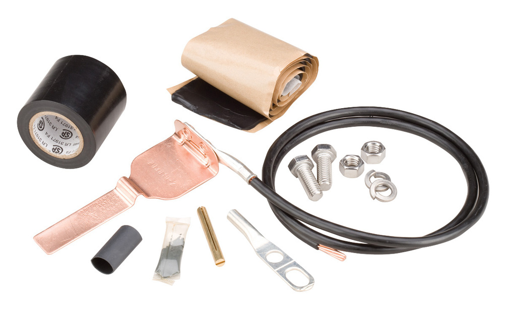 Installationsset mit Klebeband, Kabel, Klemmen, Schrauben, Muttern und Dichtungsmasse.