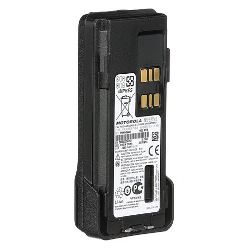 Black Motorola battery with charging connectors and label.
