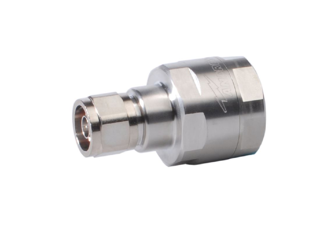 Metal coupling, cylindrical shape, threaded, silver color.