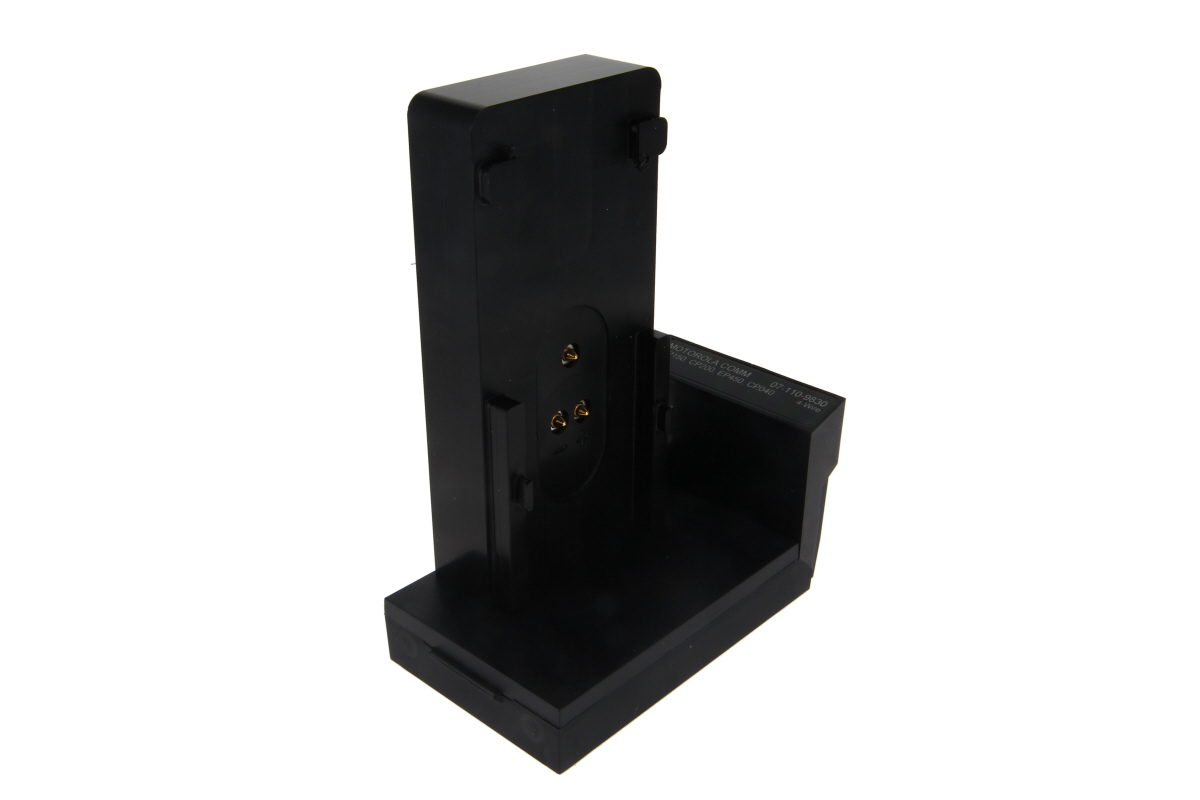 Black plastic holder with plug contacts.