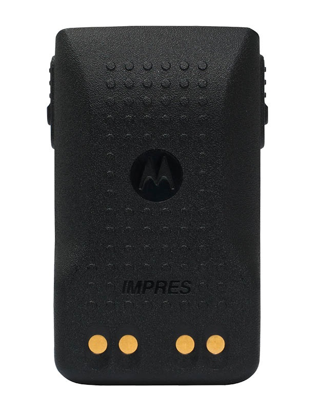 Black radio battery pack with yellow contacts.