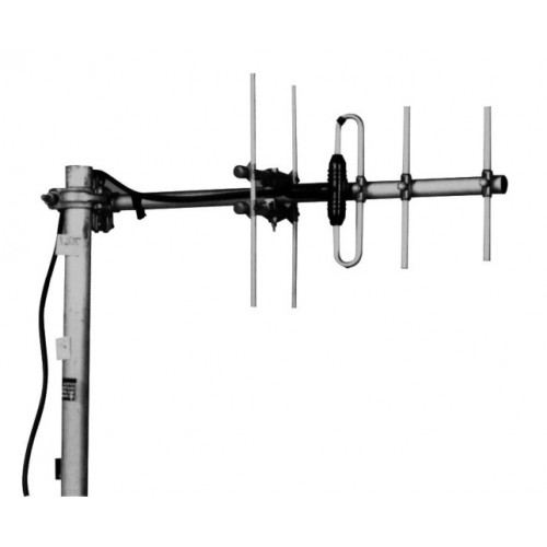 Metal antenna with multiple horizontal and vertical rods on a mast.