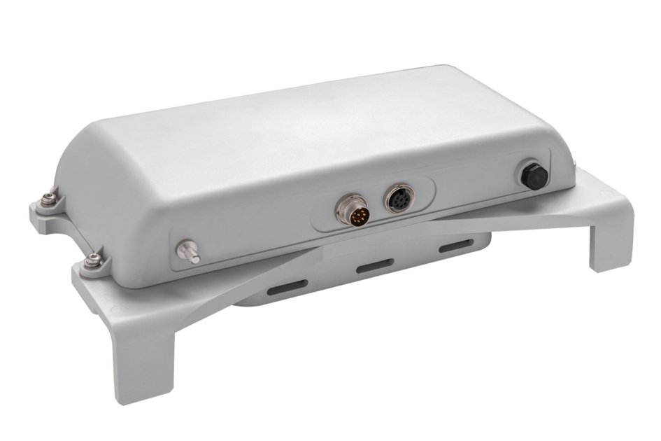 White electronic device with two round connectors.