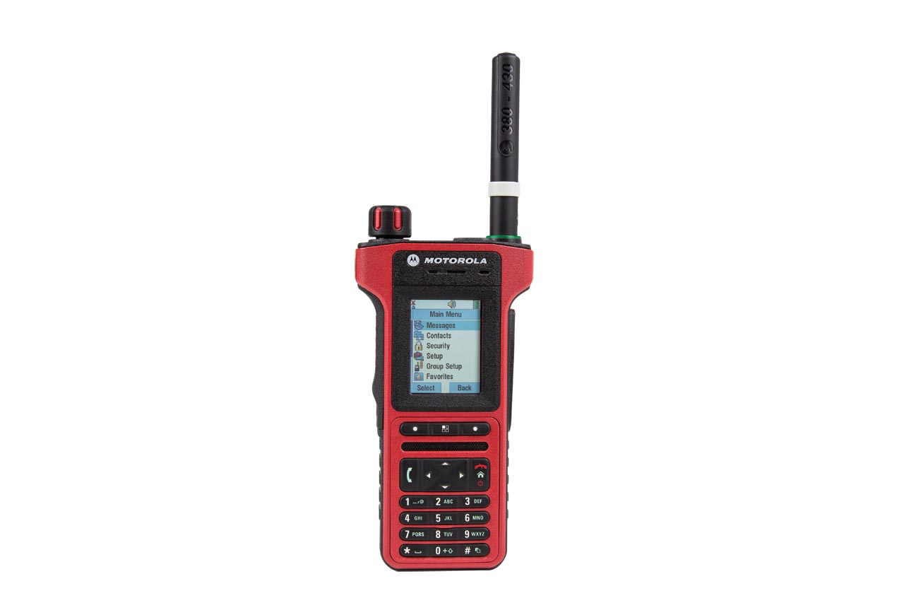 Red handheld radio with display and numeric keypad.