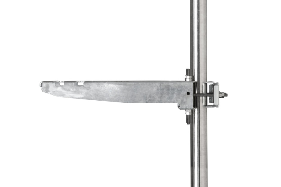Metal bracket attached to vertical pipe.