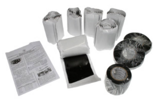 7000-00752683_rfs_01.jpg Various rolls of tape and an instruction sheet on paper.