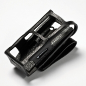 Black, textured plastic holder case with cutouts.