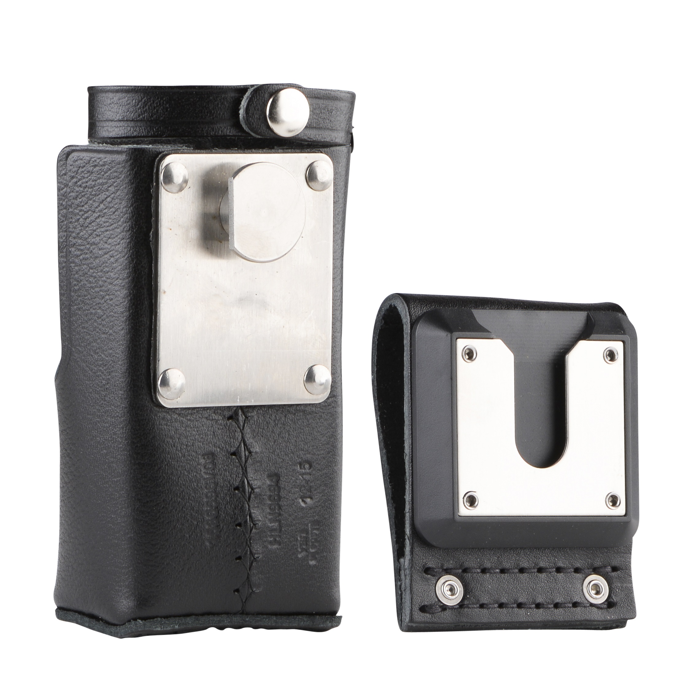 Two black leather cases with metal elements, one standing, one lying.