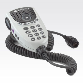 7000-00753529_mot_03.jpg Radio microphone with buttons and coiled cable.