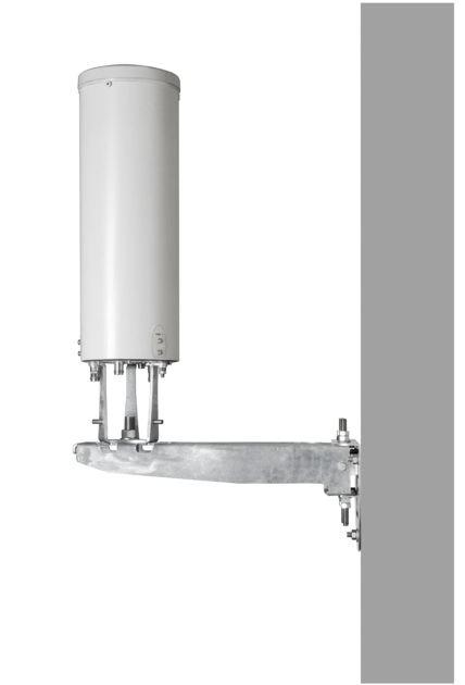 Cylindrical antenna mounted on wall.