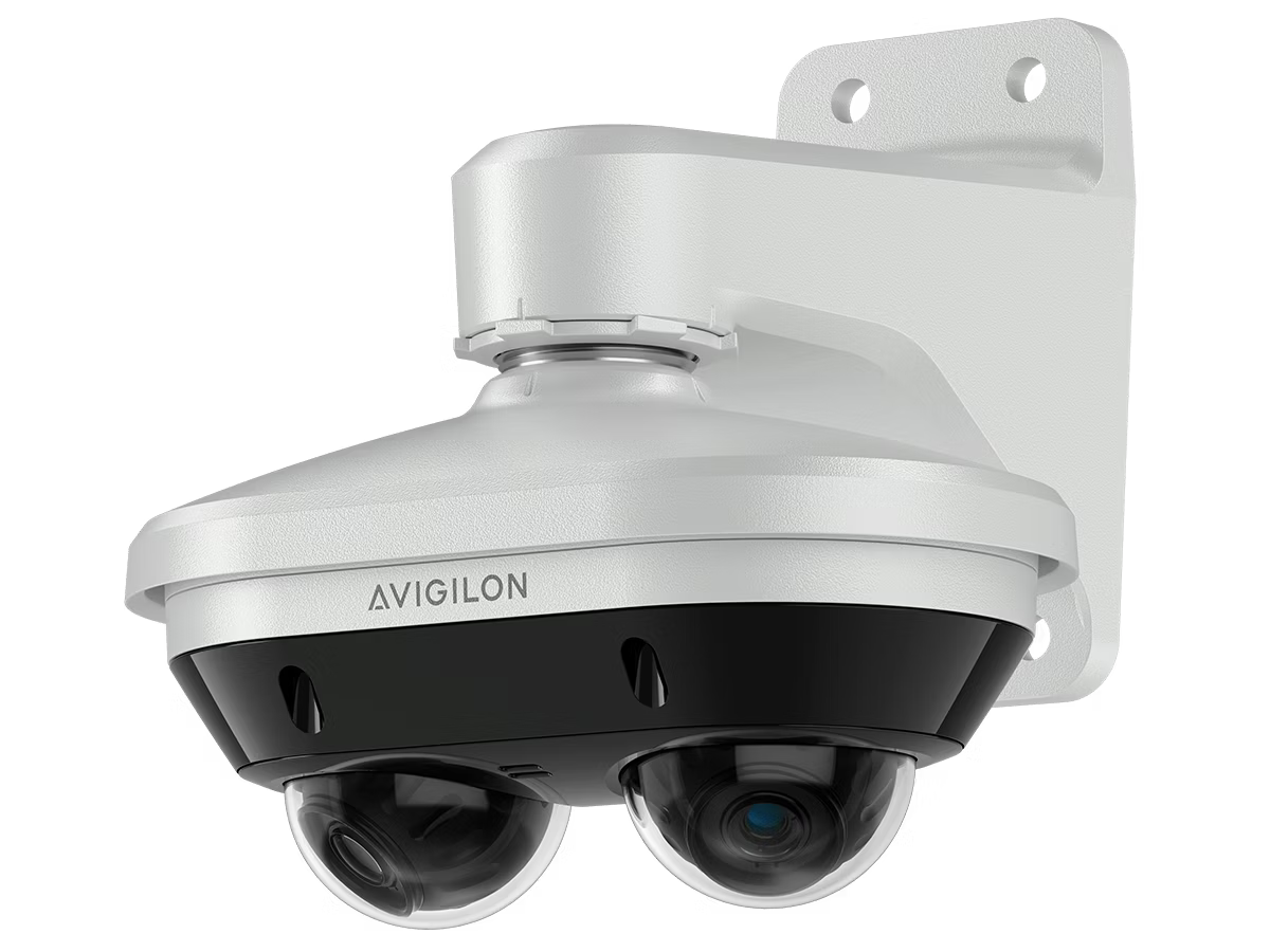 Gray surveillance camera with two lenses, mounted on a wall bracket.