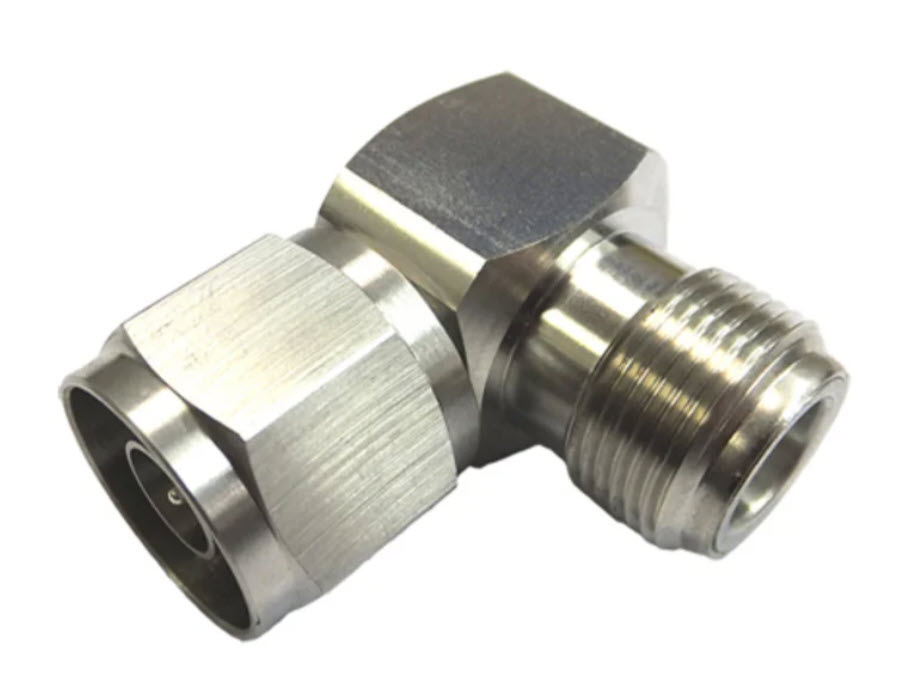 Metal 90-degree angle adapter with male and female threads for pipe connections.