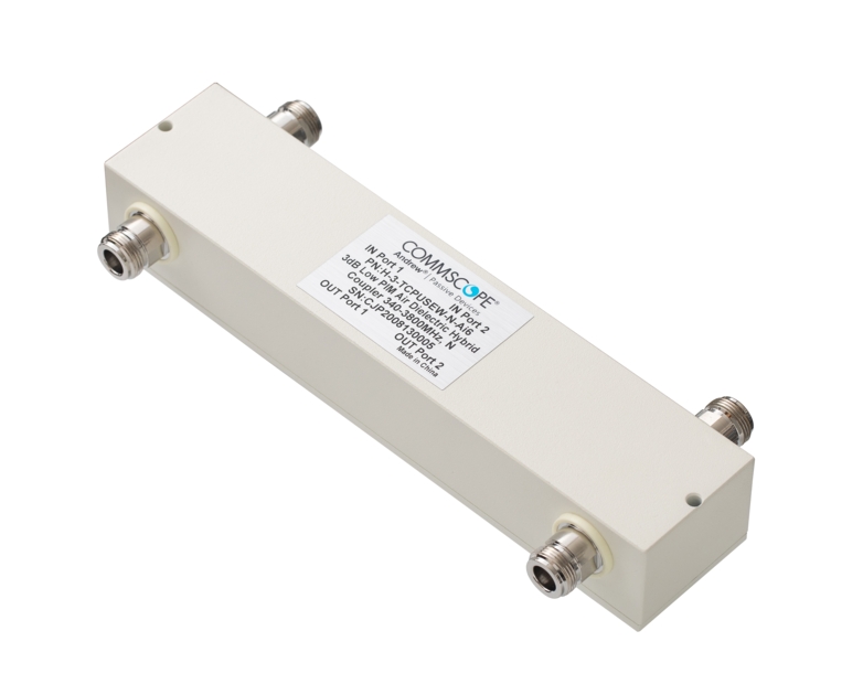 Ein rechteckiger elektrischer Verteiler mit vier Anschlüssen und einem Etikett auf der Oberseite.