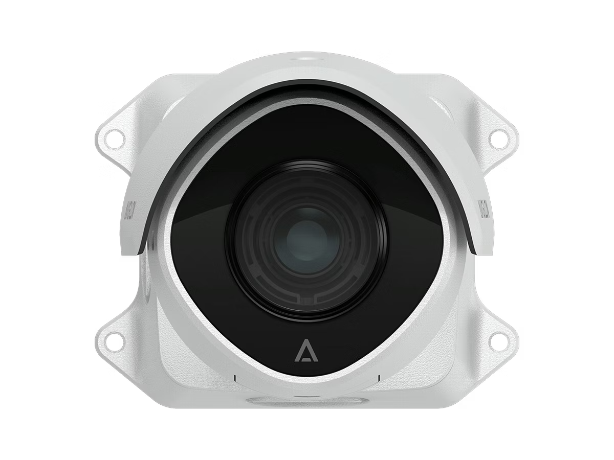 White surveillance camera with round lens, mounted.