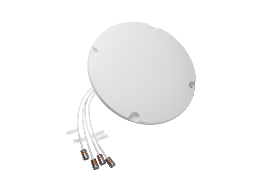 Round, white antenna with four attached cables.