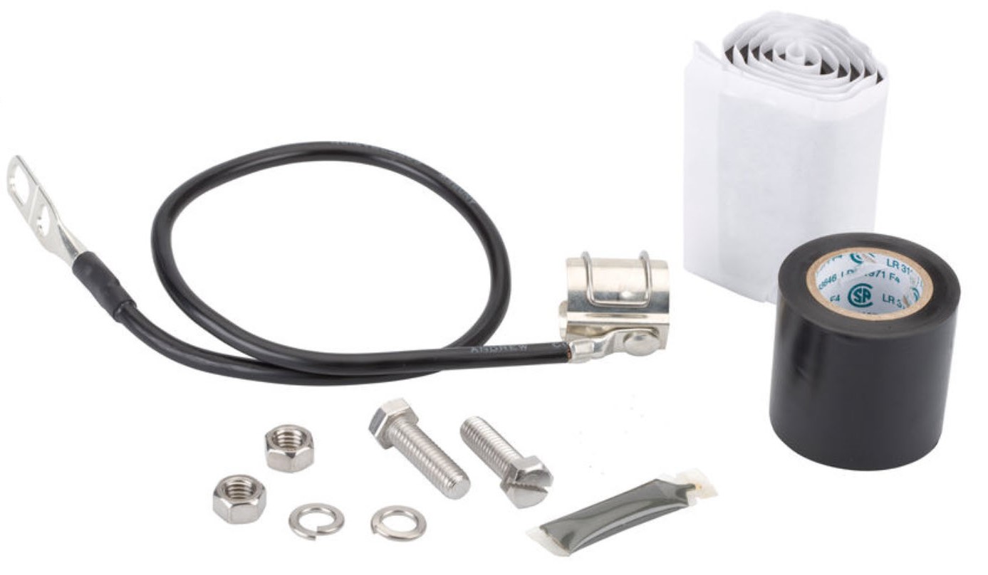 Cable assembly with terminals, bolts, nuts, tape, and sealant.