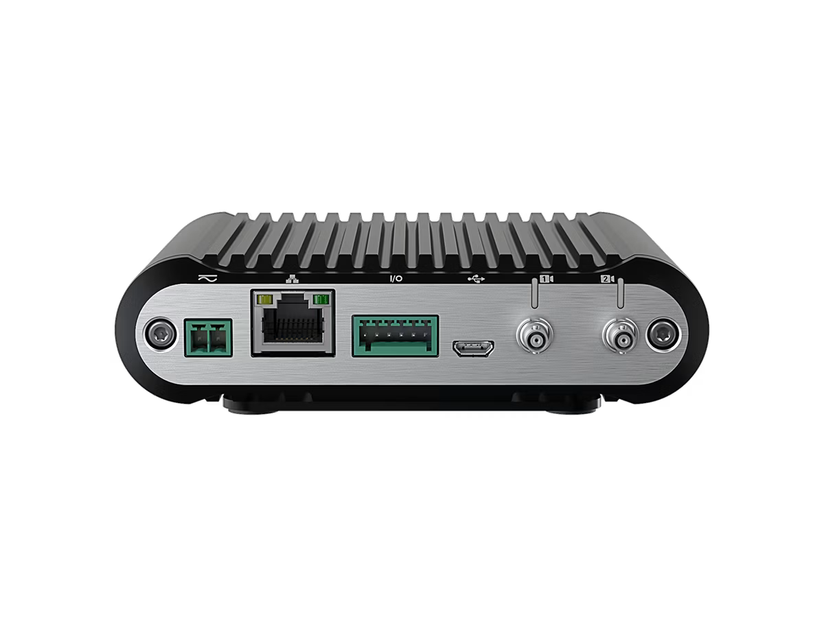 Elektronisches Gerät mit mehreren Anschlüssen und metallischer Oberfläche, einschließlich Ethernet- und USB-Anschluss.