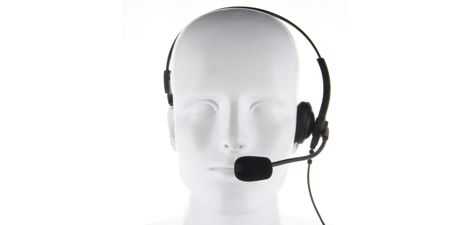 Stoffkopf mit Headset und Mikrofon.