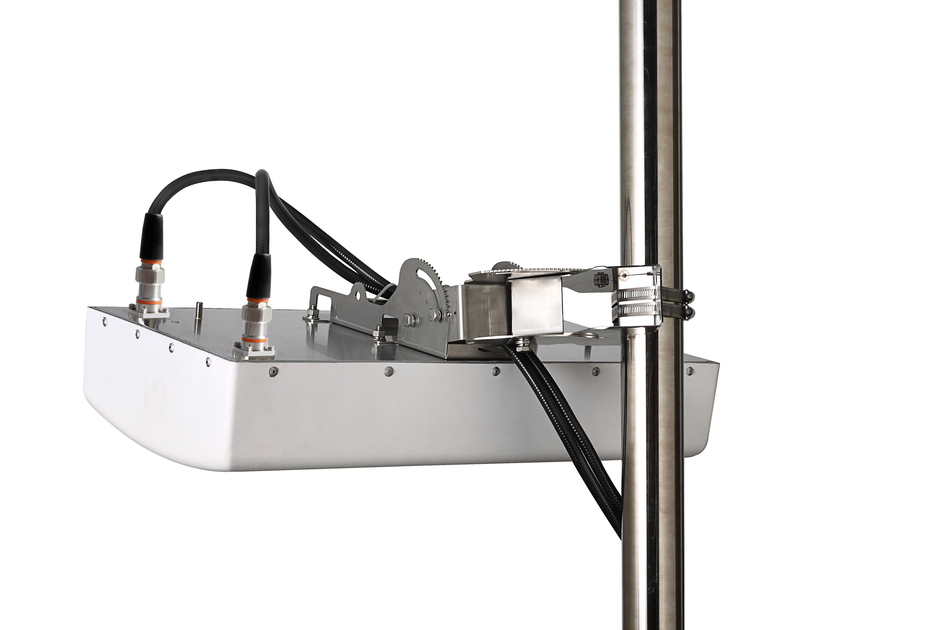 Metal casing with cables, mounted on a vertical pole.