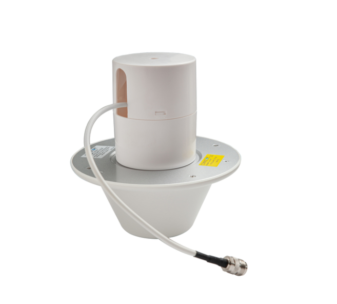 7000-00751601_com_01.png Ein zylindrisches, weißes Gerät mit Kabel und Stecker, auf einer runden Basis montiert.