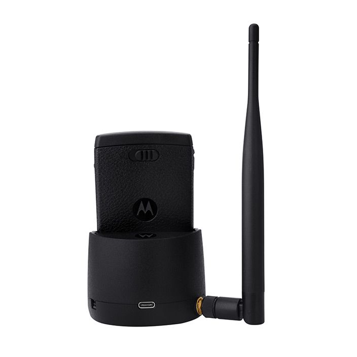 Radio in charging dock with long antenna.