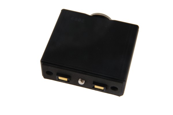 Black rectangular electronic device with connectors on one side.