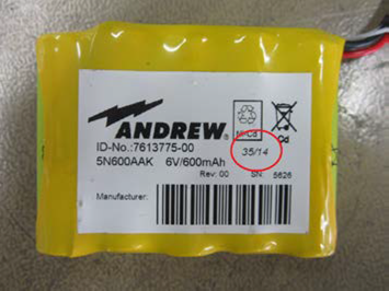 Yellow battery labeled 6V, 600mAh, manufacturer Andrew, ID 7613775-00.