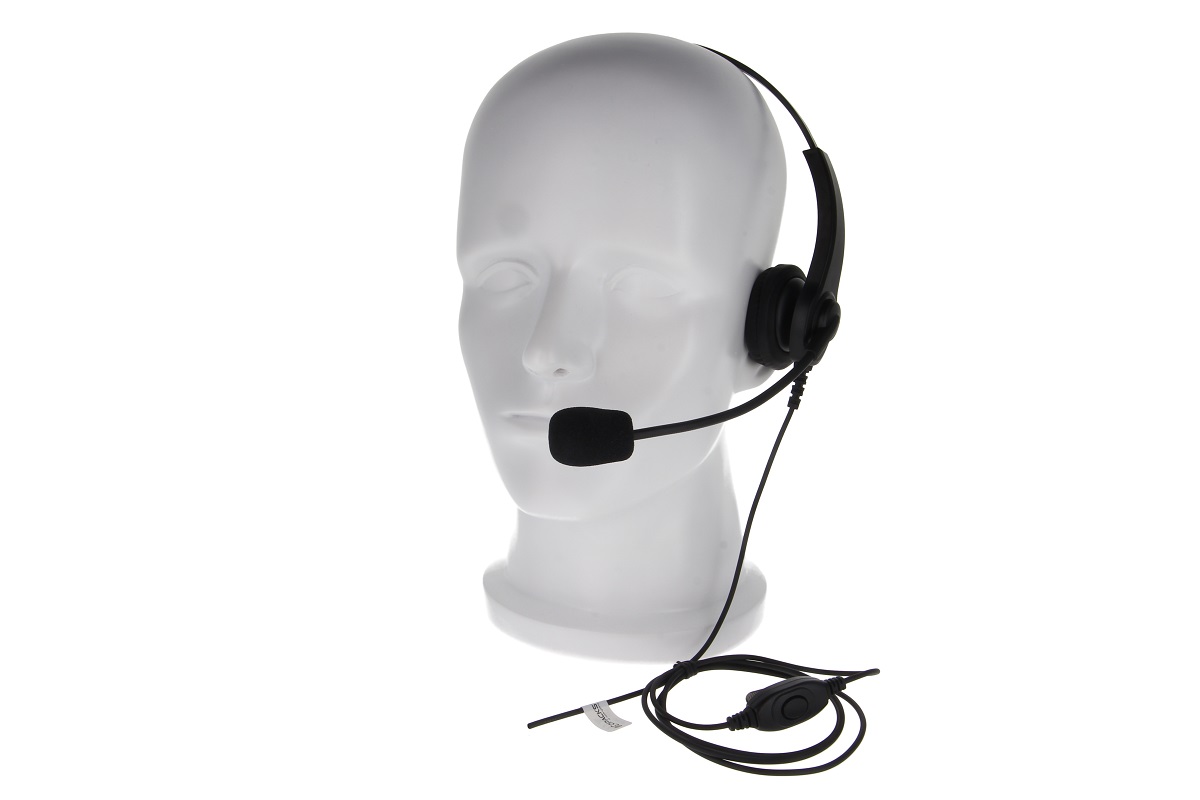 Kunststoffkopf mit Headset inklusive Mikrofon und Kabel mit Bedienungselement.