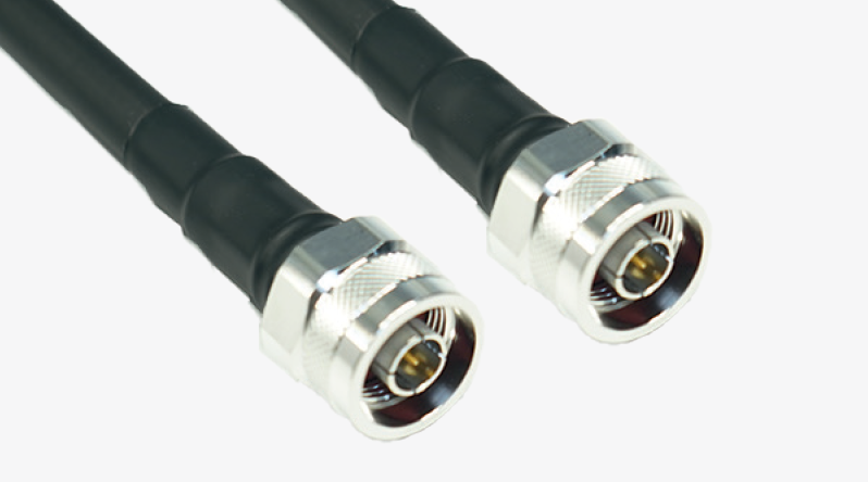 Two black coaxial cables with silver connectors.