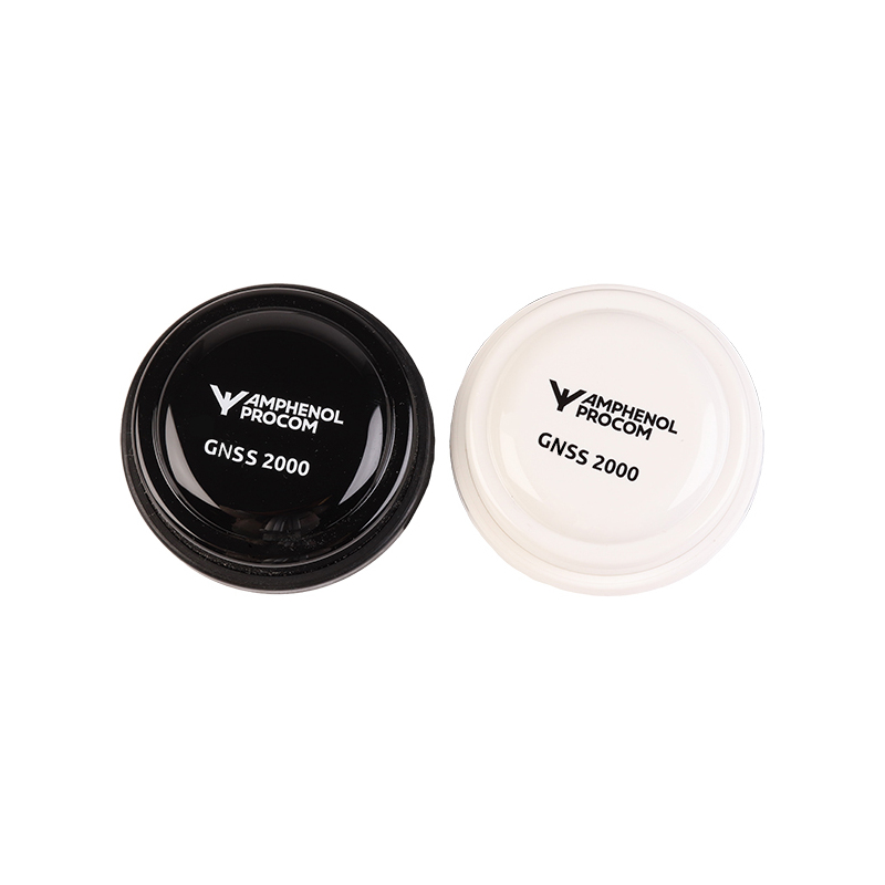 Two round GNSS 2000 antennas, one black, one white, labeled Amphenol Procom.