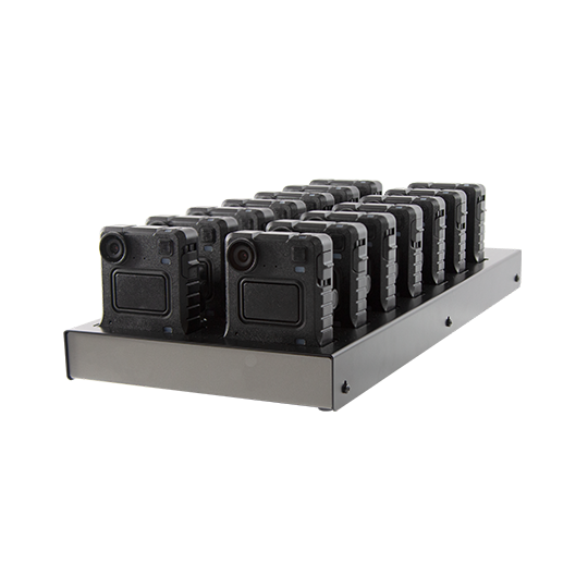 Multiple black cameras in a charging dock.
