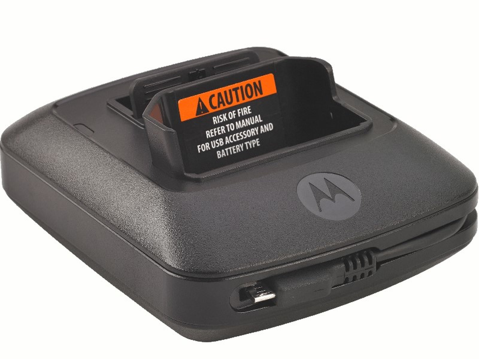 7000-00437800_mot_01.jpg Black charger with USB port and fire risk warning.